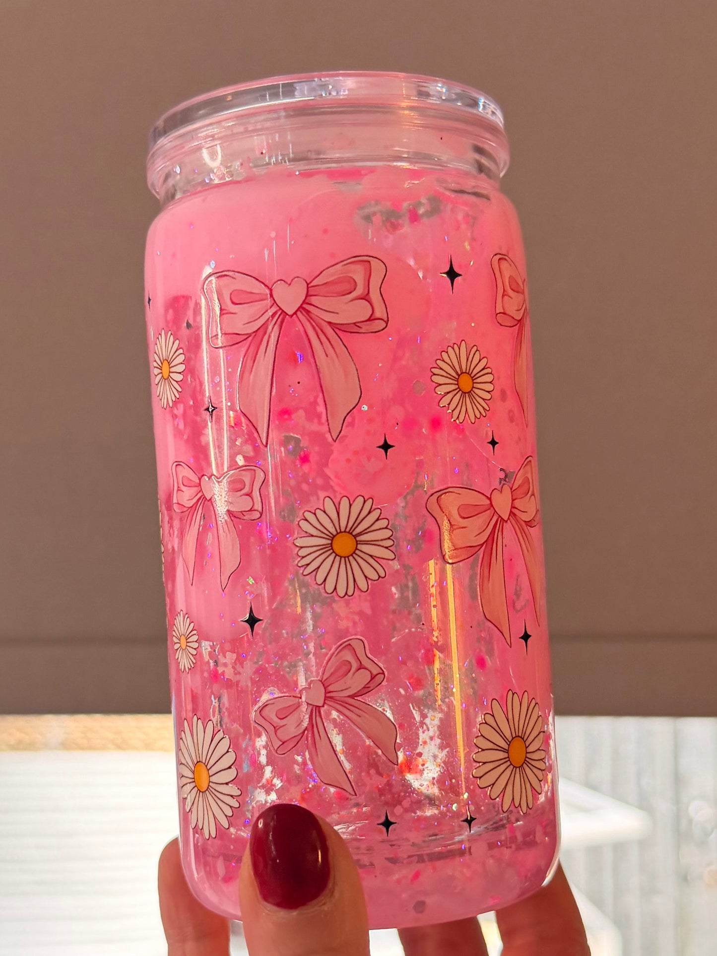 Pink lava bows and daisies